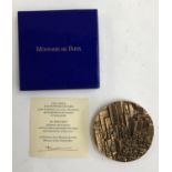 A boxed metal paperweight by Monnaie de Paris, with certificate