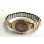 9ct gold ladies watch with metal strap (engraving on the back )
