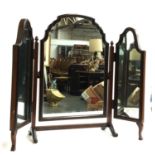 A three part adjustable dressing mirror