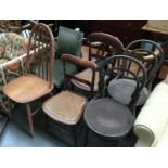 An Ercol style hoop back chair, two Thonet style bentwood chairs, a pair of 19th century