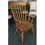 A 20th century beech lathe back kitchen open armchair