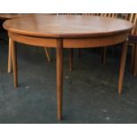 A mid century teak circular extending table, 122cmD
