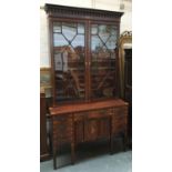 A 19th century mahogany and marquetry astragal glazed bookshelf, on base with single drawer over
