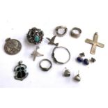 A quantity of jewellery to include rings, medals, a pierced sphere of turquoise, earrings etc