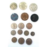 A collection of coins to include a 1898 maundy threepence; 1928 sixpence; 1962 sixpence; 1951 half-