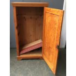 An early 20th century pine cupboard with shelves and hooks to interior, 74x43x137cm