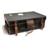 An early 20th century leather and canvas suitcase, the side marked EMC, leather side handles,