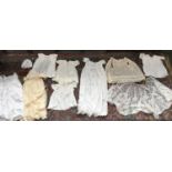 A mixed lot to include christening gowns, lace shawl, etc