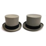 Two grey felt top hats by Moss Bros., size 7 1/4 and 6 7/8