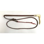 A child or ladies hunting whip with metal collar, antler handle, and 3 1/2 thong and lash