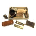 A vintage shoe cleaning kit, various brushes, weightman buffer, enamel mug, military issue equipment