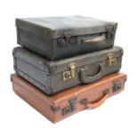 Three small gent's suitcases, the largest 40cm wide