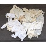 A large box of vintage children?s and baby clothing