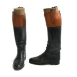 A pair of black leather hunting boots with mahogany tops, with wooden trees, approx. size 9.5