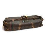 A vintage brown leather cricket bag with key inscribed J.G.E., approx. 95cm long