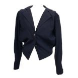 A vintage Jean Muir navy wool jacket and skirt with button and zip side fastening, size 8
