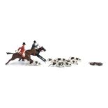 Two Britains huntsman figures, together with seven hounds and a fox