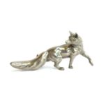 A Continental white metal fox figurine, 23cmL