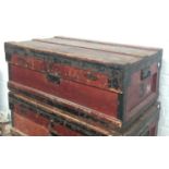 A metal lined travel wood and canvas travel trunk with metal bracings, bears label 'The Marshall