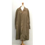 A gent's single breasted Burberry raincoat, with burrella cheque lining