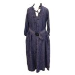 A vintage Jean Muir silk dress, size 10, with lip shaped buckle, two pockets