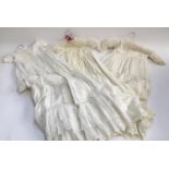 A lot of four christening gowns (4)