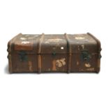 A vintage travel trunk with wooden banding, travel stickers, 92x33x55cm