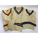 Two vintage cricket jumpers, one by Beale & Inman, London; together with a sleeveless cricket jumper