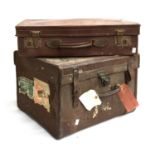 A canvas covered vintage suitcase, 46x44x31cm; together with one other leather suitcase, 56cmW