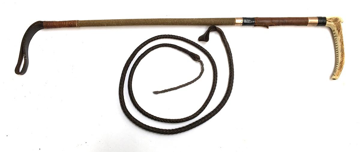 A gent's hunting whale bone and antler hunting whip with two 9ct gold collars, the first inscribed