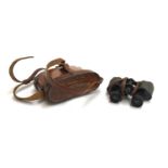 A pair of 'Special' 8X OG27 binoculars, in hard leather case, bearing broad arrow
