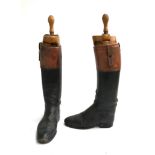 A pair of Davis black leather hunting boots with tops and wooden trees, approx. size 9.5