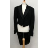 A gent's evening tails (Moss Bros.), approximately 38" chest; with a marcella white tie waistcoat