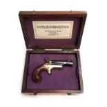 A Colt No.3 Derringer .41 calibre rim fire pocket pistol, walnut pistol grip, proof marks under