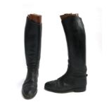 A pair of black leather hunting boots made by Davis, with good wooden trees, approx. size 9.5,