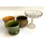 Three ceramic planters; together with a glass bonbon dish on stem