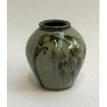 A studio pottery vase, floral underglaze decoration, marked to base, 13.5cmH