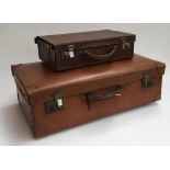 A vintage suitcase, 66cmW; together with a small gent's leather overnight case, 41cmW