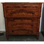 An American faux mahogany chest of drawers in the North Country style, comprising two short over