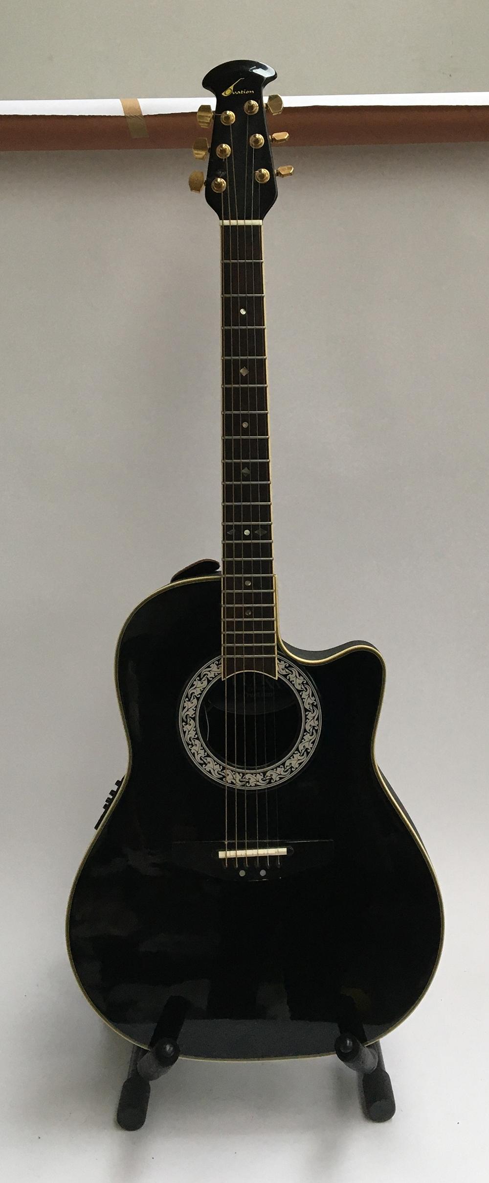 An Ultra Deluxe by Ovation roundback electro-acoustic guitar model number 1527D, made in Korea, in