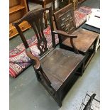 A Georgian oak commode open armchair; together with an oak side chair with geometric back