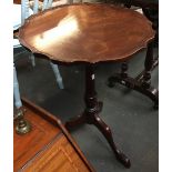 A 20th century tripod table, with pie crust edge, 51cmD