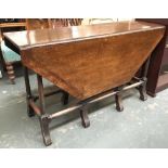 An octagonal oak gateleg table, 121cmW