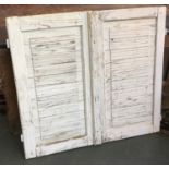 A pair of white washed shutters, each 80x41cm
