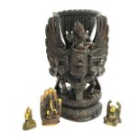 A carved hardwood Garuda, 30cmH; together with three small brass buddhas