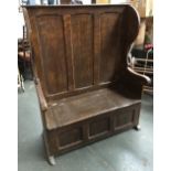 A pine monk's bench/settle, with hinged seat, 113cmW