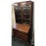 A 20th century glazed bureau bookcase, cabriole legs with claw feet, 91cmW