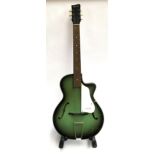 A Egmund 'Green Sunburst' acoustic guitar with cutaway and f holes, in vintage hard case