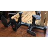 Three cast iron shoe slobs