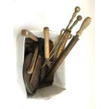 A mixed lot of vintage hand tools and fire tools